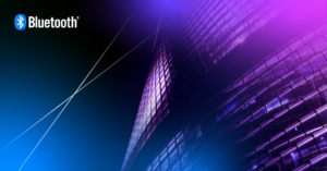 Bluetooth logo with a futuristic building in a vibrant gradient, symbolizing modern connectivity.