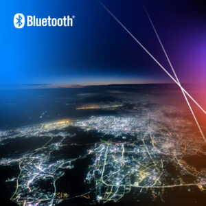 Vibrant city skyline at night with Bluetooth logo symbolizing modern connectivity and innovation.